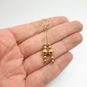 Gold drop bead earrings